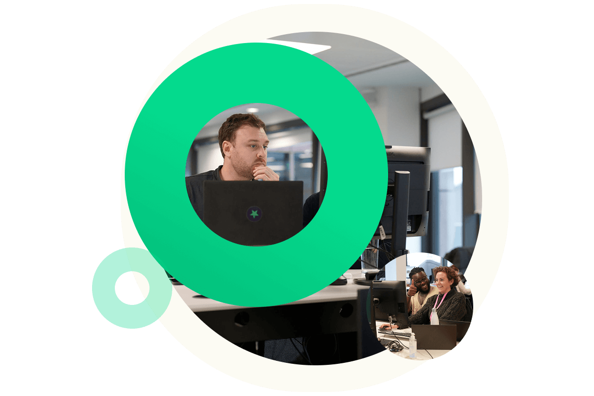 A Green circle graphic which contains an image in the centre of a man using his laptop, at his desk