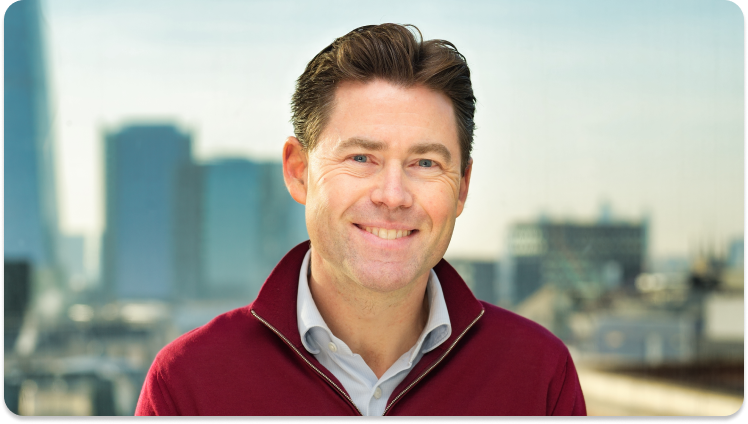 A photo of Adrian Blair, Chief Executive Officer at Trustpilot